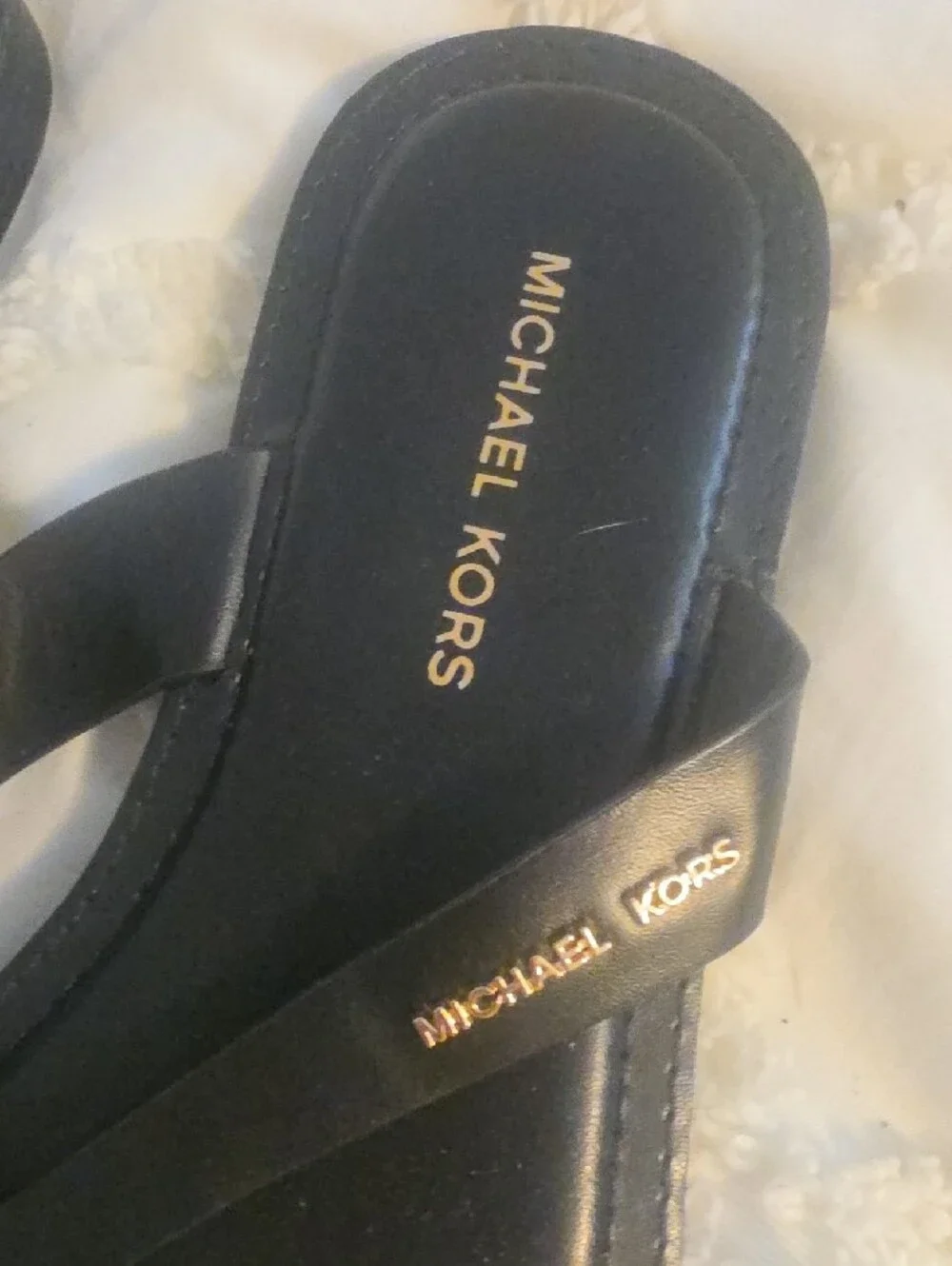 Michael Kors Black Slip-On Thong Sandals with Gold Logo
